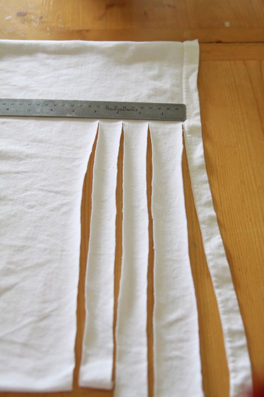 white knit fabric cut into strips