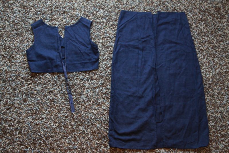 Navy blue dress cut in half at waist