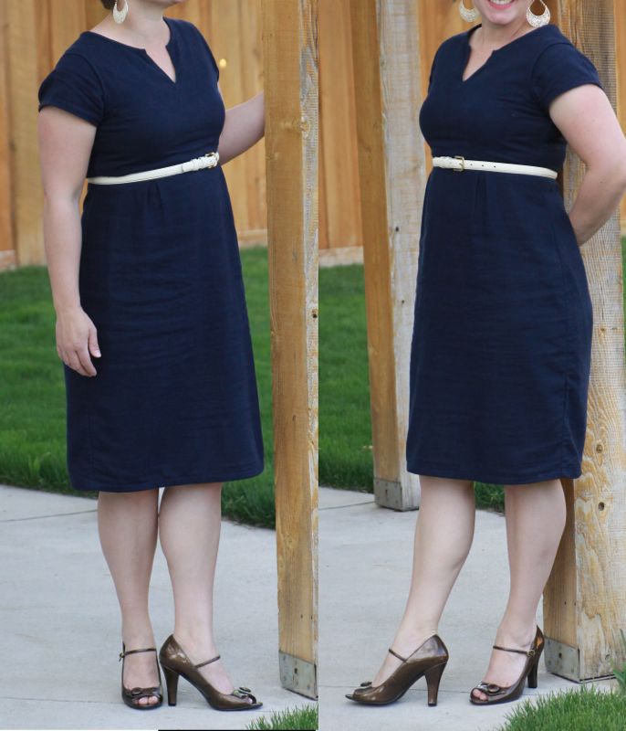 A woman wearing a navy knee length dress