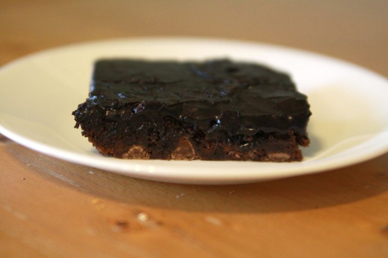 a dark chocolate brownie on a plate