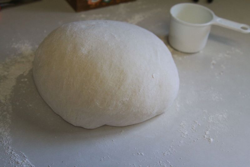 French bread dough formed into a ball