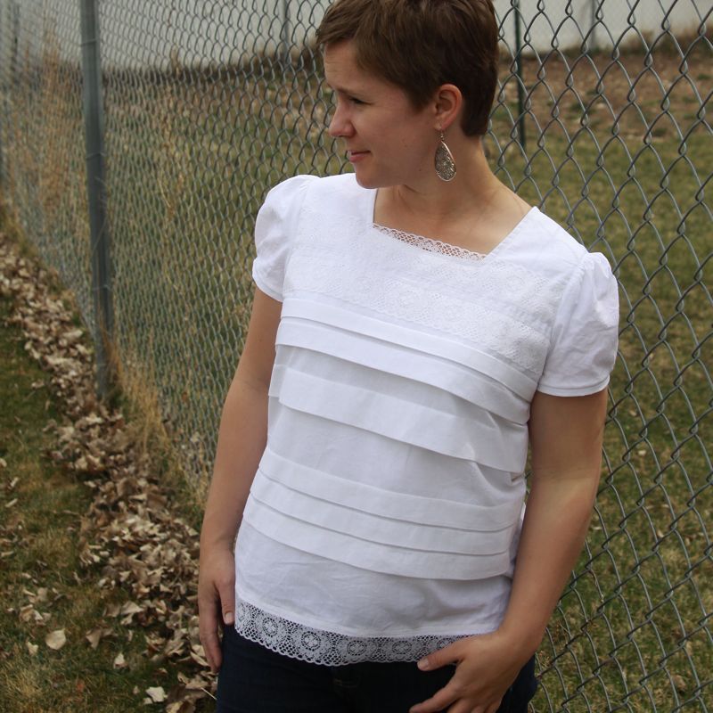 A woman with a white blouse
