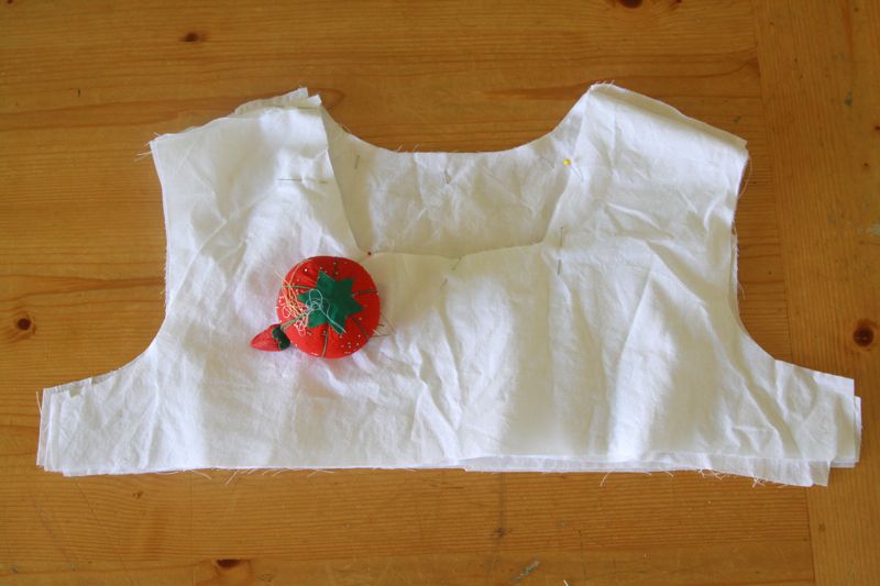front and back pieces pinned together at the shoulders