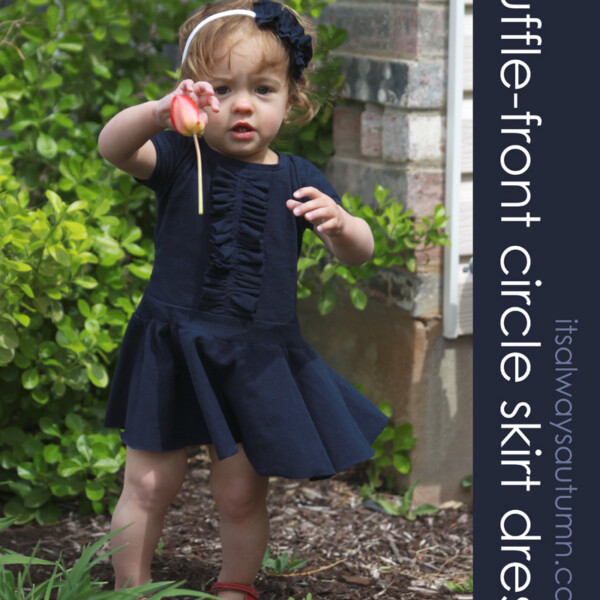 baby girl wearing ruffle front dress