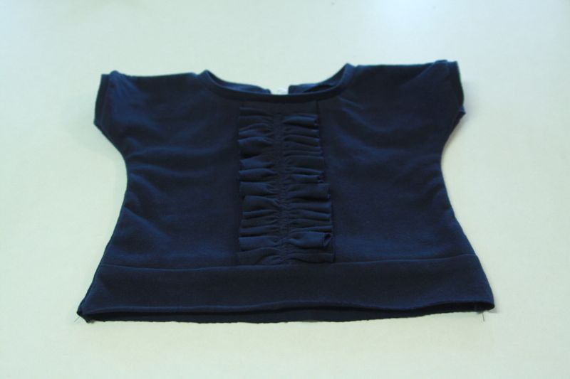 dress top front and back sewn together with neckline finished