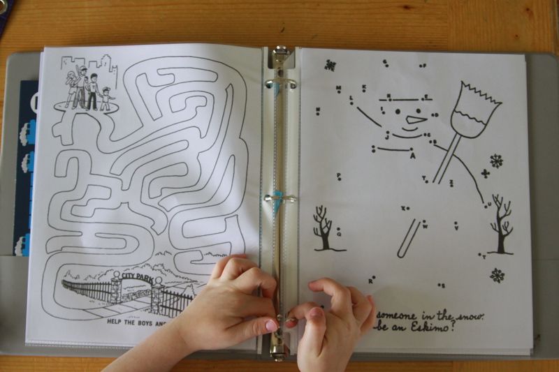 Maze and dot to dot pages in a binder