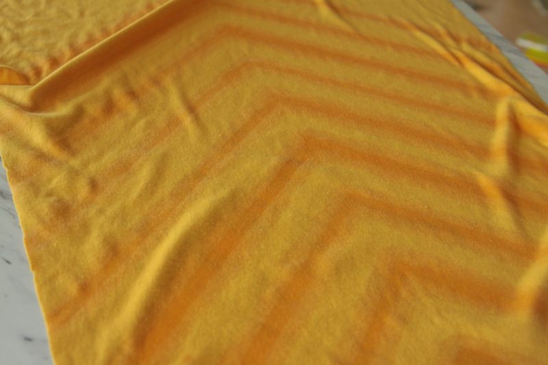 yellow fabric with chevron print made from bleach