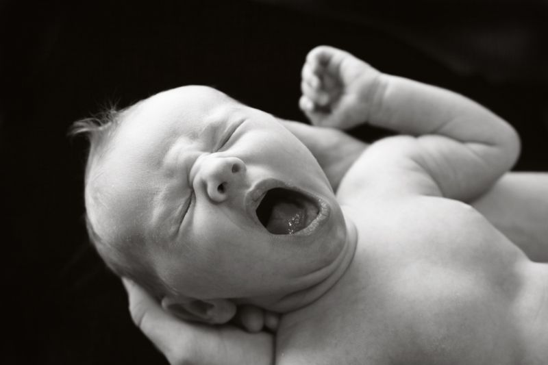 A baby yawning