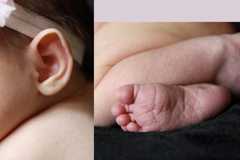 Closeup of newborn baby\'s ear, foot