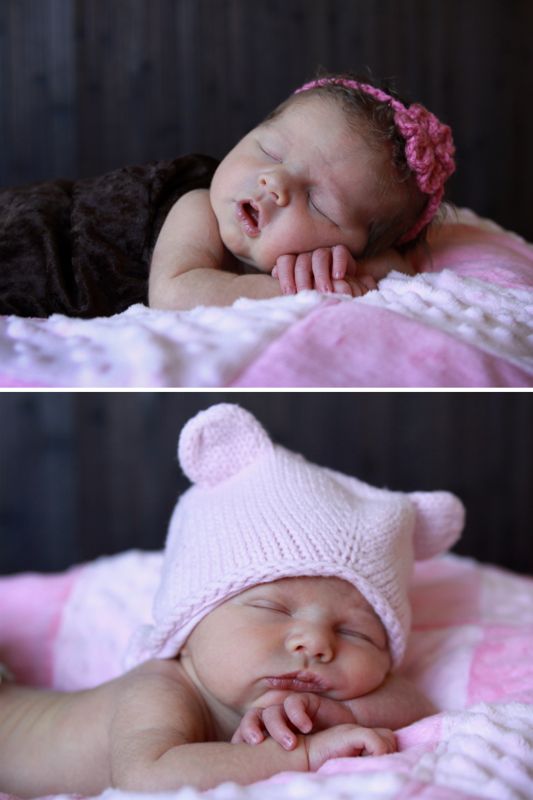 A little newborn girl baby lying on a pink blanket