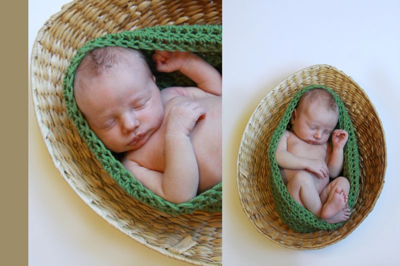 Newborn baby photo: a baby wrapped in a green crochet swaddle in a wicker basket