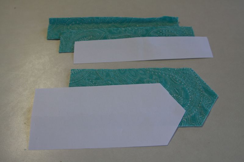 bow pieces cut from turquoise fabric