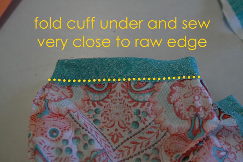 Cuff folded to the inside of the short. sew very close to raw edge