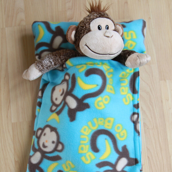 Learn how to make a stuffed animal sleeping bag with this easy sewing tutorial and free pattern.