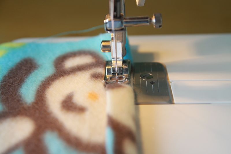 Turning up a hem and sewing on a sewing machine