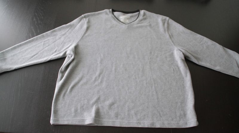 A large grey mens sweater