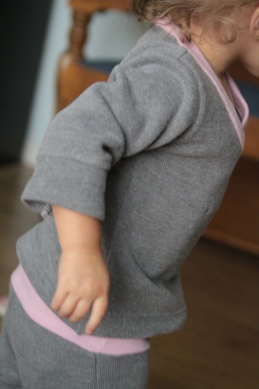 a little girl in pjs