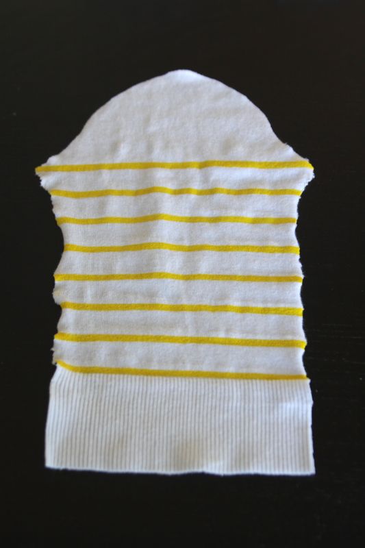 Sweater sleeve with yellow stripes