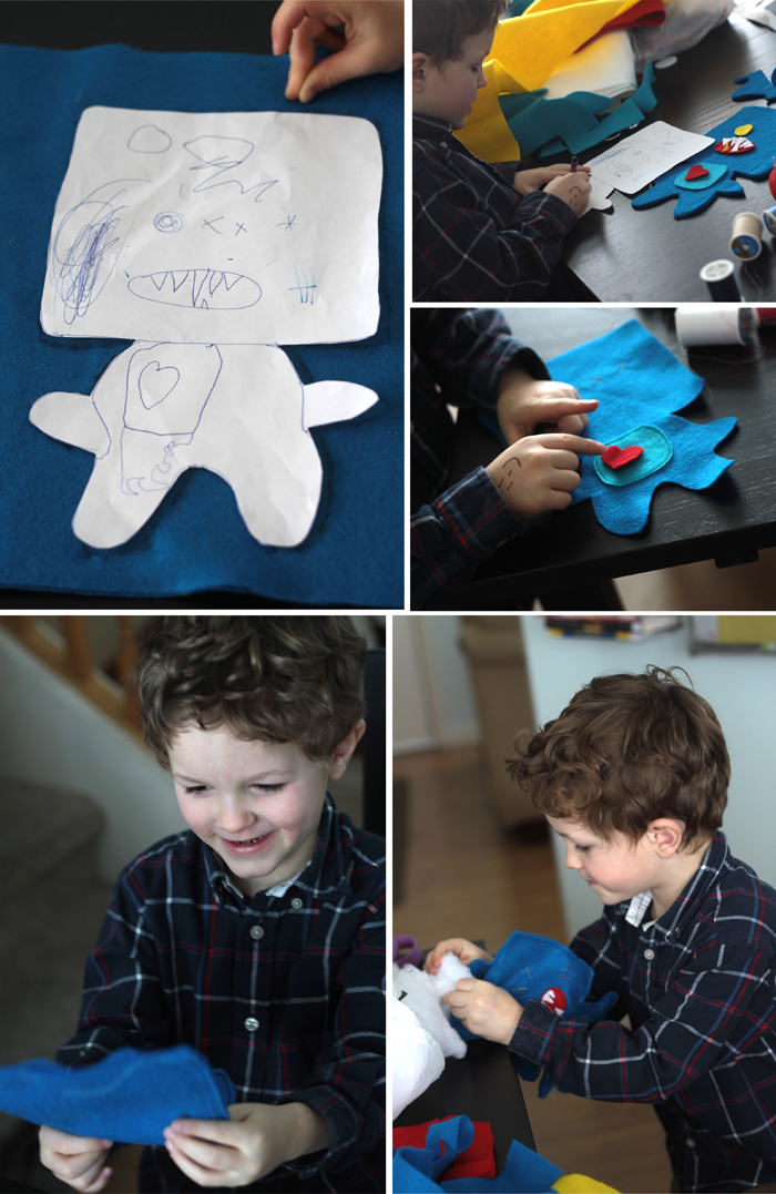 Little boy making a felt monster