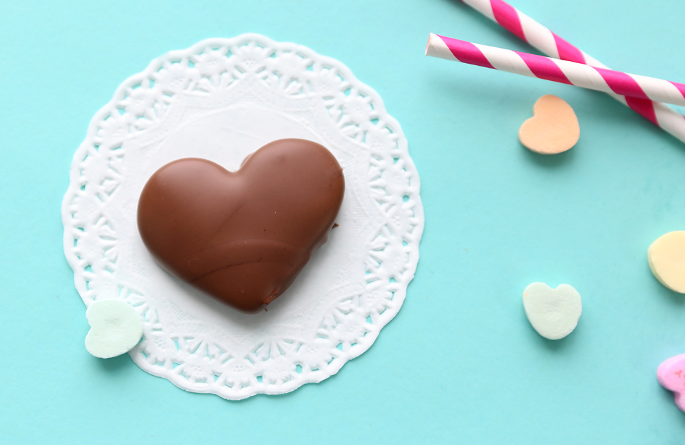 Chocolate covered heart on a doily