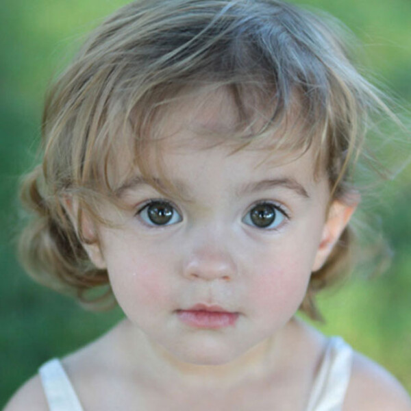 A little girl posing for the camera