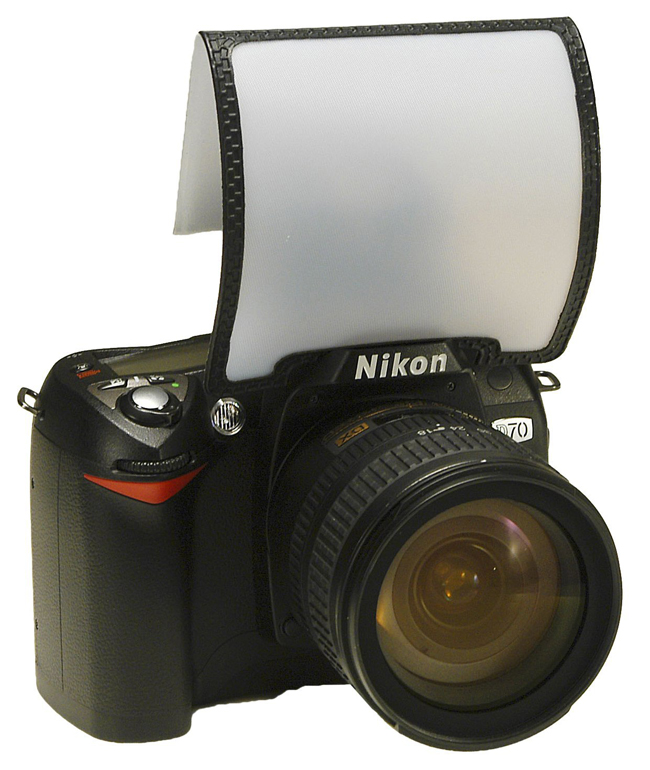 A close up of a camera with a flash diffuser
