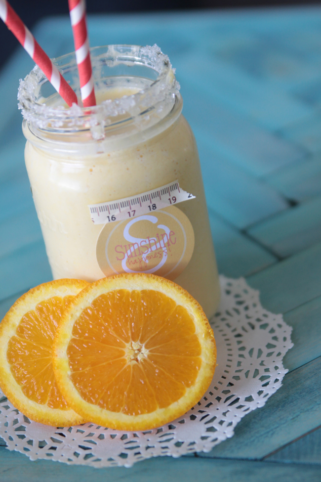 orange smoothie in a mason jar