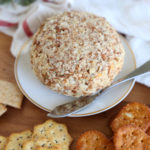 Bacon ranch cheeseball surrounded by crackers