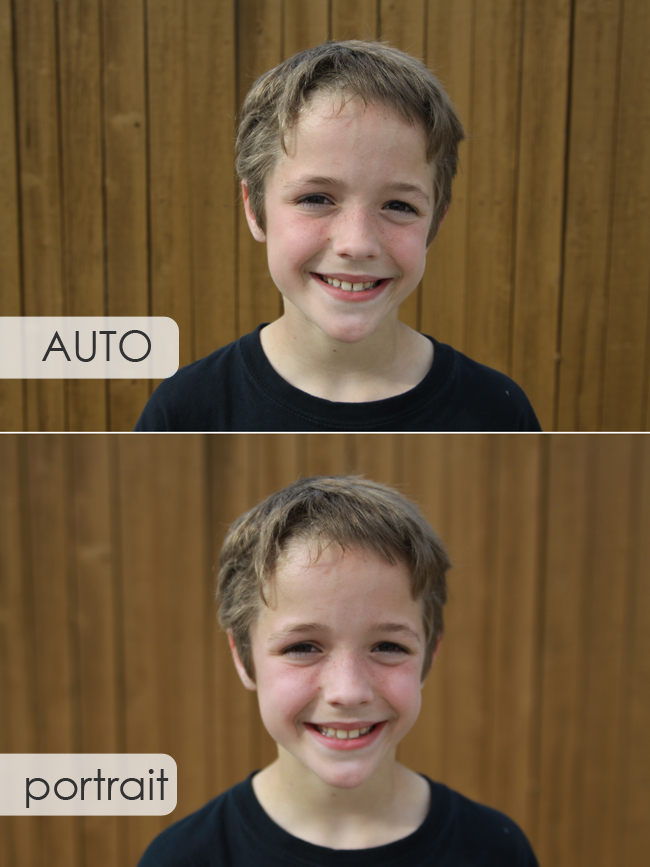 A young boy who is a few feet in front of a fence; background is more blurred on portrait mode than auto