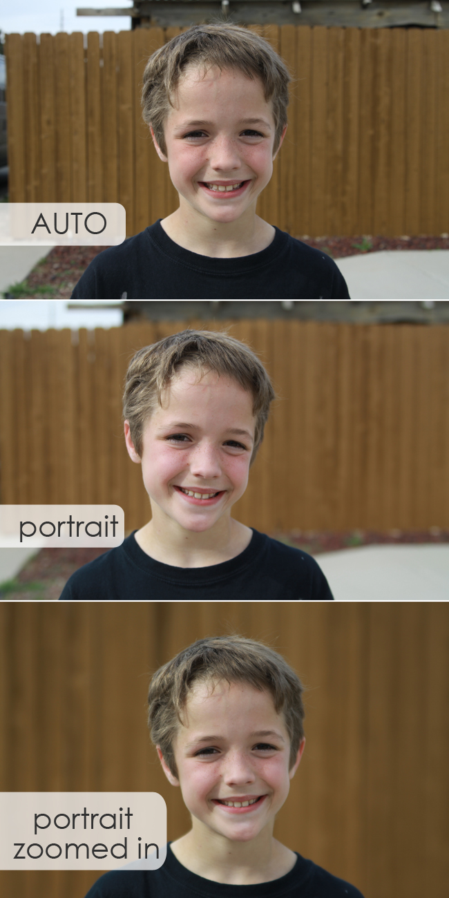 boy standing far in front of a fence; background is in focus when taken on auto, more blurry when taken on portrait; very blurry when zoomed in on portrait mode