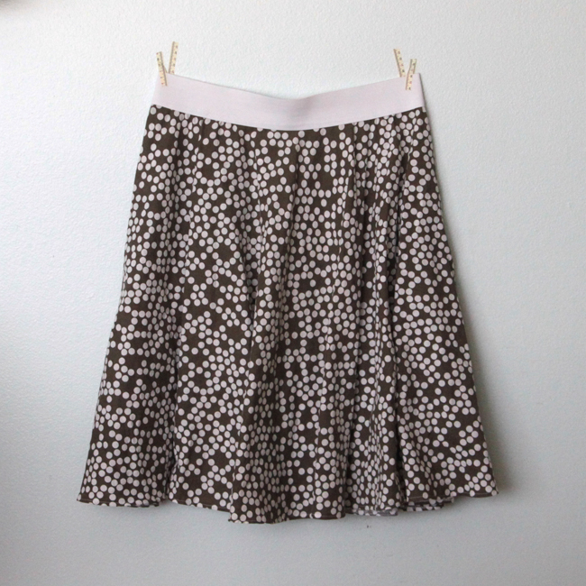 A circle skirt hanging on a wall