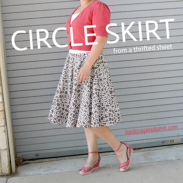 A woman standing in front of a building wearing a circle skirt made from a thrifted sheet