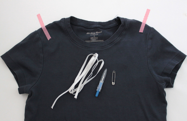 A navy t-shirt, narrow elastic, seam ripper, safety pin