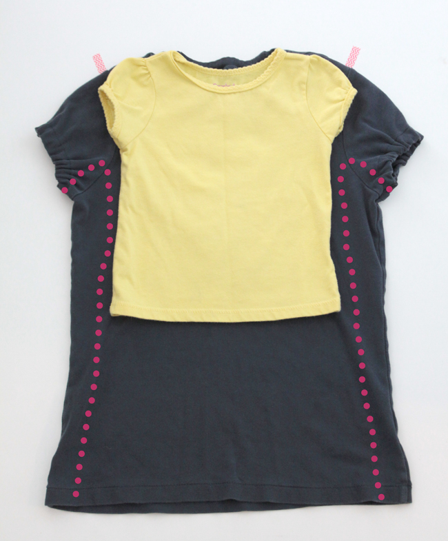 girl\'s shirt layered over the larger blue t-shirt, new side seams marked