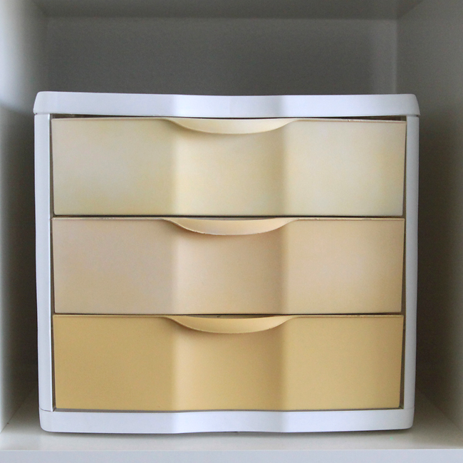 Plastic drawers painted shade of yellow