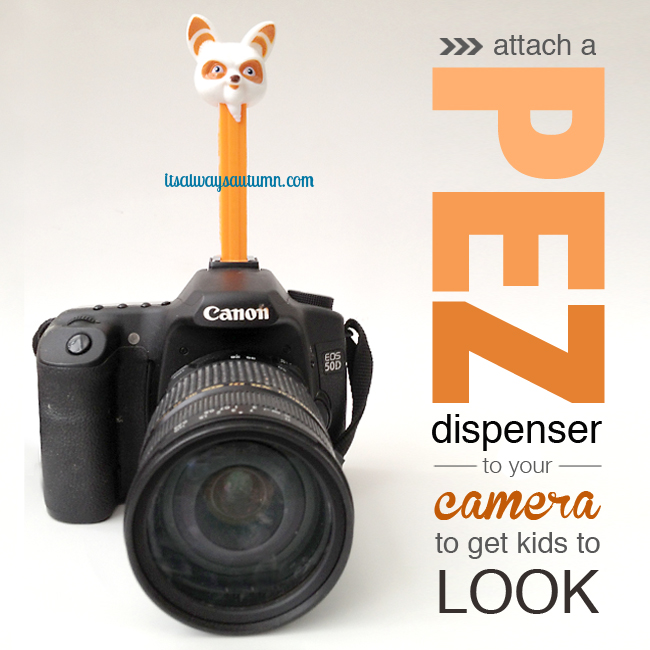 Camera with pez dispenser on top to encourage kids to look