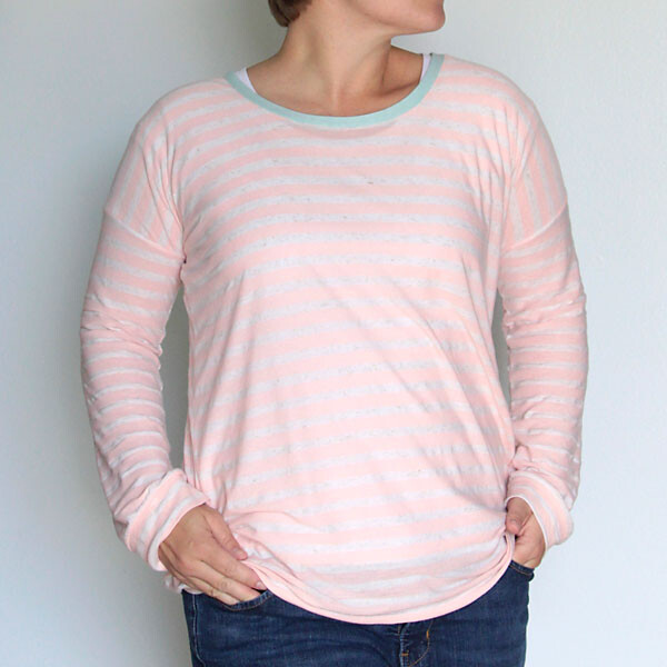 A woman wearing a long sleeve t-shirt