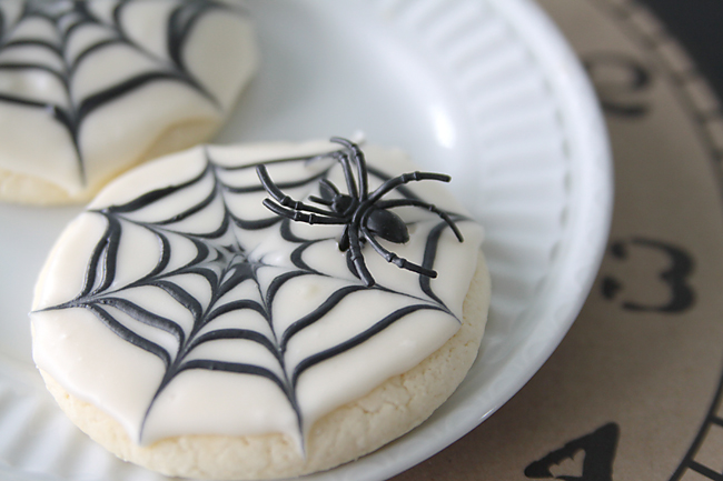 Spiderweb sugar cookie with plastic spider