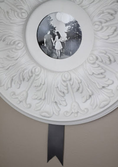 Photo frame made from a medallion