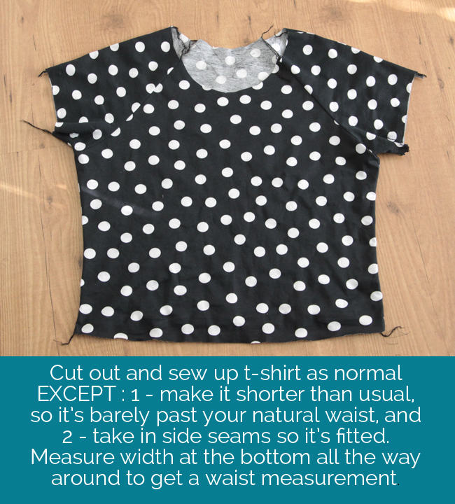 Black t-shirt with white polka dots cut at natural waist length