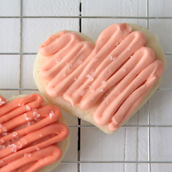 Heart shaped sugar cookie with pink frosting