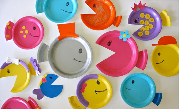 Paper plates cut and decorated to look like fish