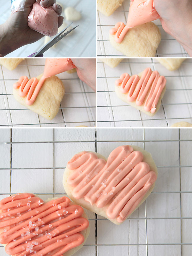 Using ziplock sandwich bag with corner snipped off to pipe frosting onto sugar cookies