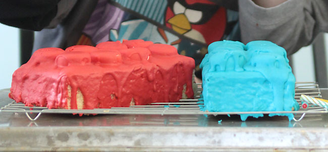 messy birthday cake made to look like LEGOS