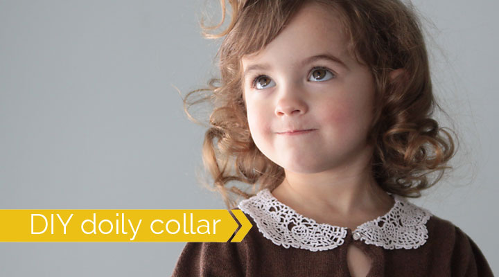 A girl with a white doily collar