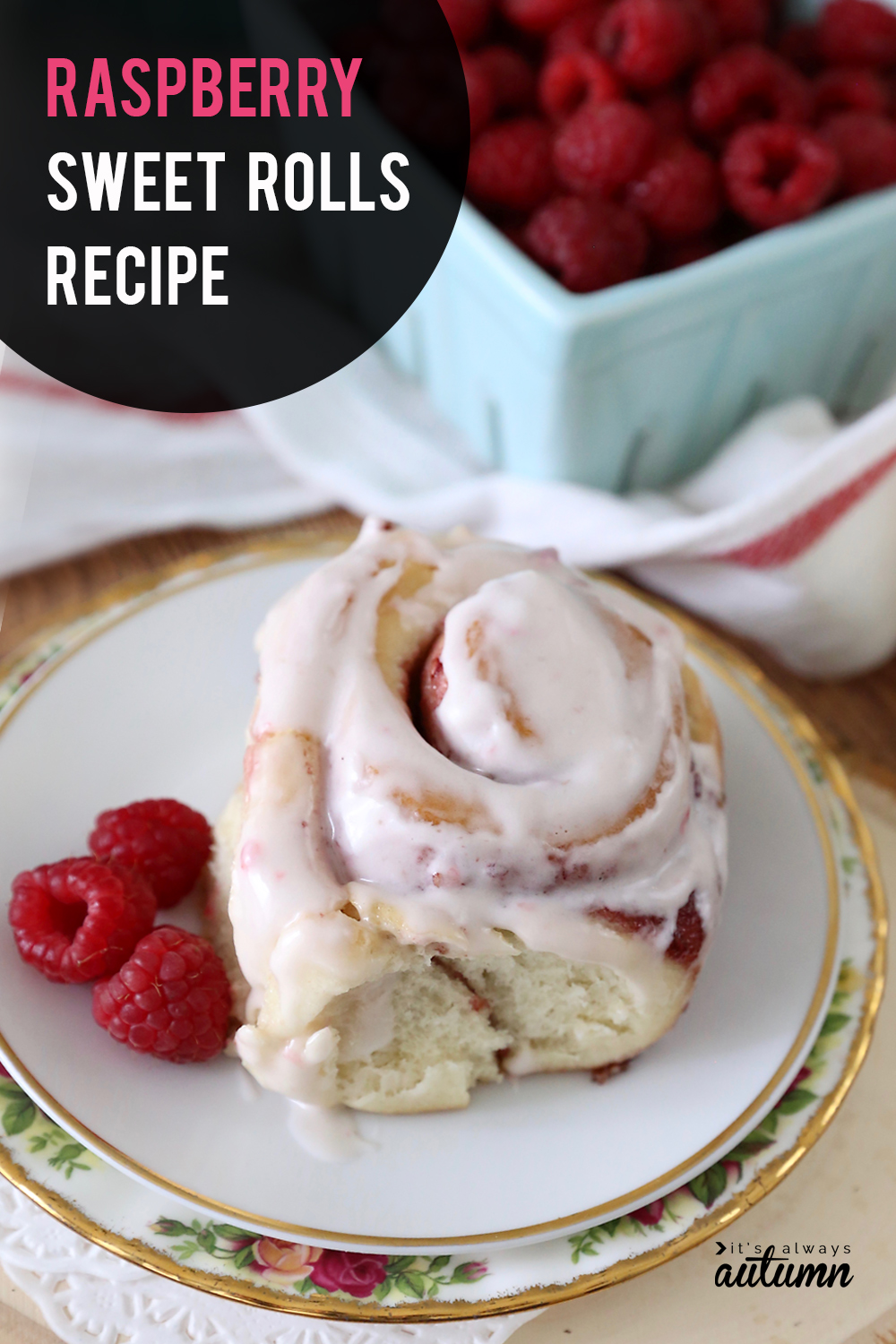 Raspberry sweet roll on a plate with raspberries