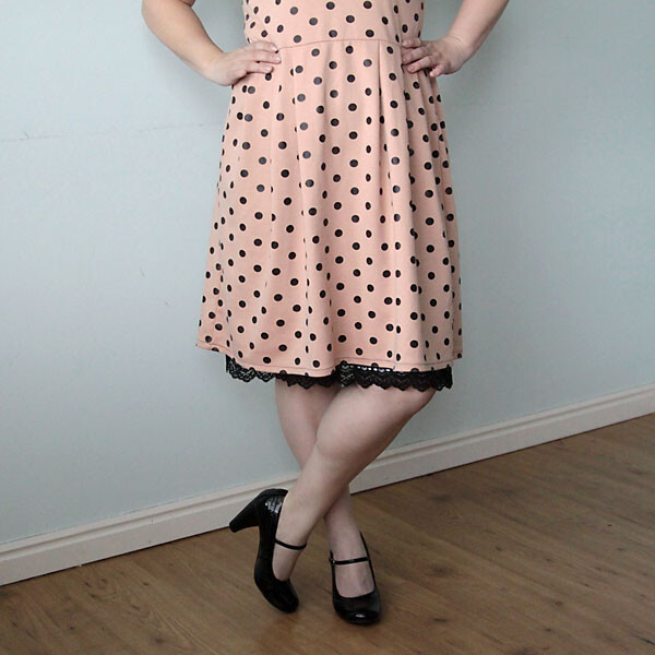 A woman wearing polka dot dress