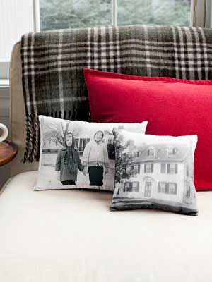 DIY photo pillows on a bed