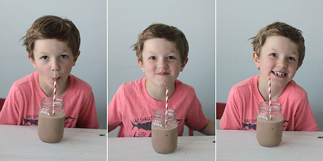 boy drinking a chocolate breakfast smoothie
