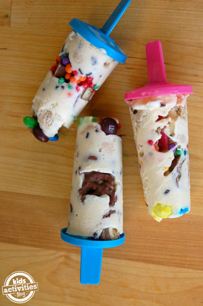 Ice cream pops with candy and brownie pieces in them